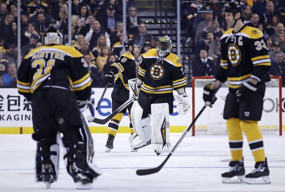 Bruins goalie Malcolm Subban, center, is replaced by goalie Zane McIntryre (31) in the second period after allowing his third goal of the game.