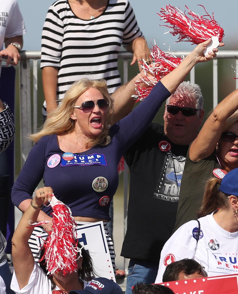 A woman cheers Republican presidential candidate Donald Trump at a rally at Orlando Sanford International Airport on Tuesday in Sanford, Fla.