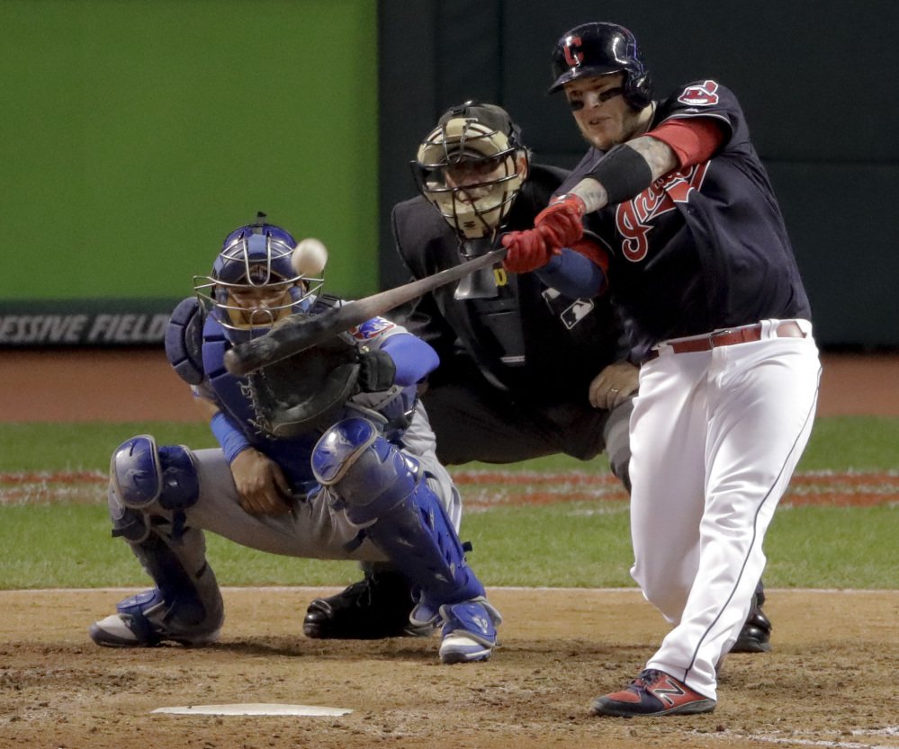The Indians' Roberto Perez hits a three-run home run in the eighth inning, giving Cleveland a 6-0 lead. Perez became the first No. 9 batter to homer twice in a World Series game.