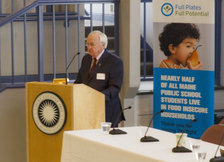 Kevin Concannon gives the keynote speech at a summit on childhood hunger at Colby College.