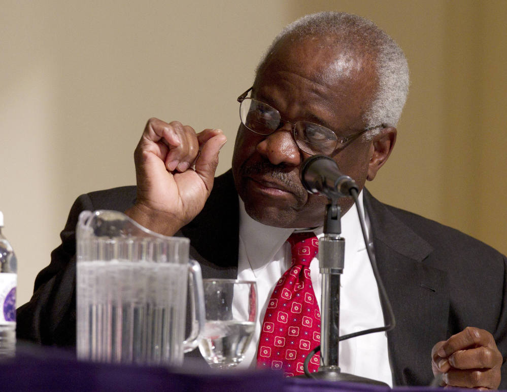 Supreme Court Justice Clarence Thomas says a claim that he groped a young woman at a Washington dinner party in 1999 "is preposterous."