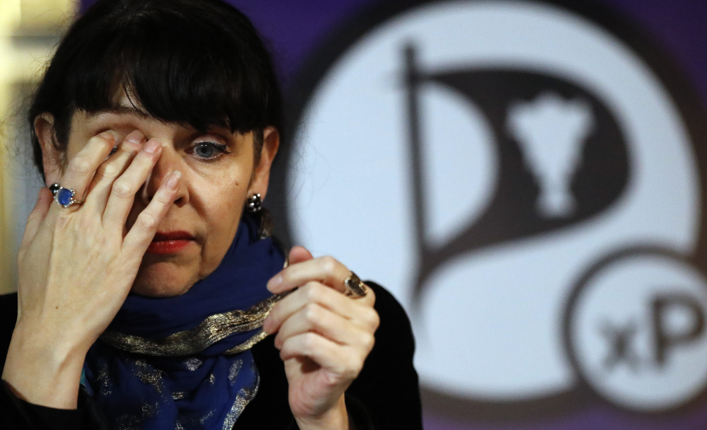 Birgitta Jonsdottir of the Pirate Party addresses the media during a news conference in Reykjavik, Iceland, on Sunday after the national elections.