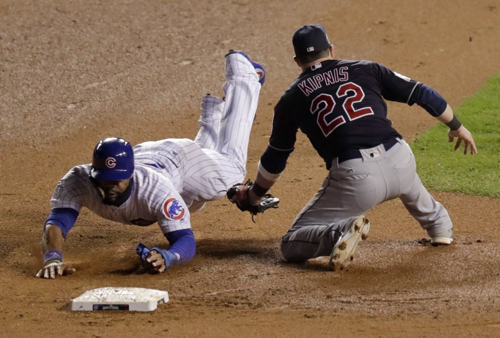 Chicago Cubs' Jason Heyward steals second past Cleveland Indians second baseman Jason Kipnis during the eighth inning of Game 5 of the World Series on Sunday in Chicago.