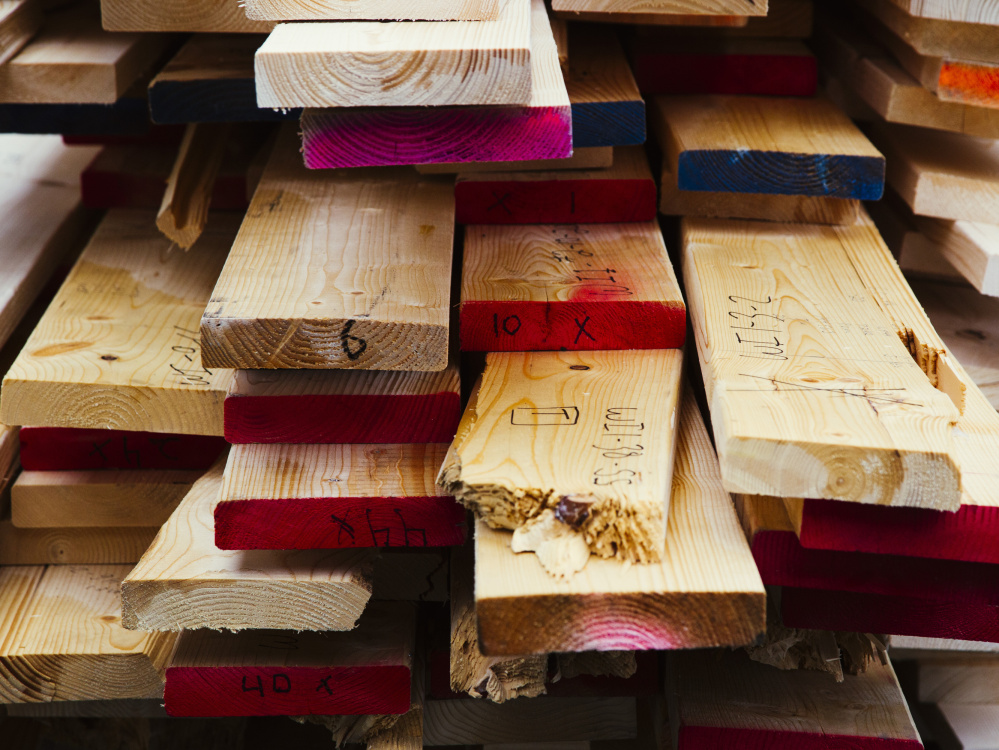 The University of Maine's Advanced Structures and Composites Center's collection of broken pieces of Norway spruce lumber, used in testing the suitability of the wood as building material.