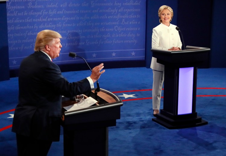 Republican presidential nominee Donald Trump debates Democratic presidential nominee Hillary Clinton during the third presidential debate at UNLV in Las Vegas, Wednesday.