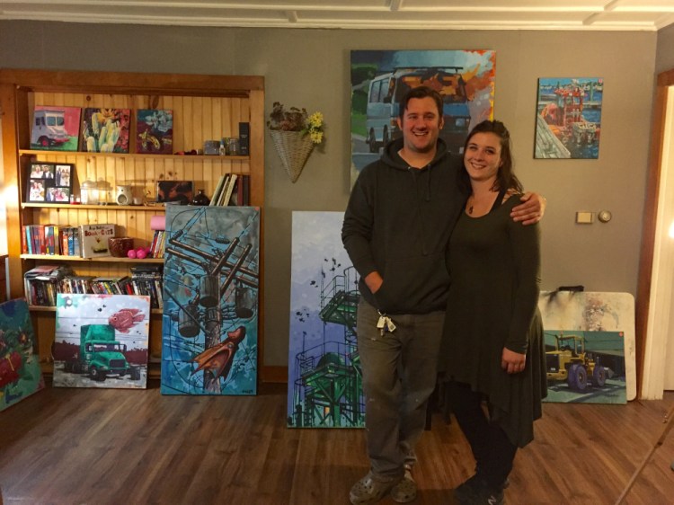 Artists Ryan Kohler and Danielle Harker opened their home Saturday in Skowhegan as part of the Wesserunsett Arts Council's seventh annual Open Studio Tour. The couple are seen standing in front of selections of Kolher's oil paintings.
