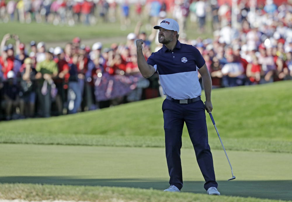 United States' Ryan Moore reacts after winning the 17th hole during a singles match at the Ryder Cup on Sunday at Hazeltine National Golf Club in Chaska, Minnesota.