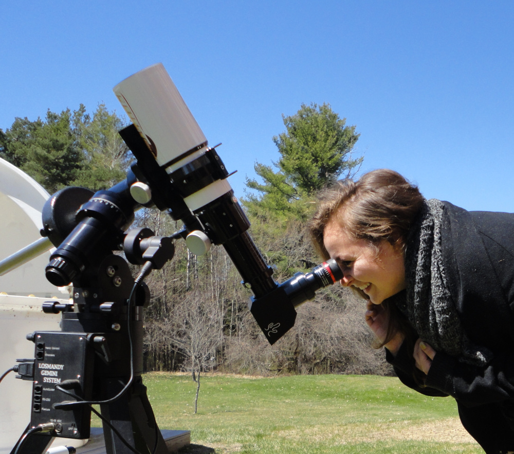 Dianna Wendell of Vassalboro looks through the Lunt Telescope.