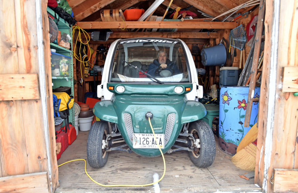 Iver Lofving sits in his electric car in a shed at his home in Skowhegan earlier this year. Lofving, an art teacher at Skowhegan Area High School, is the subject of a new documentary film, "Peak Oil: A Love Story," which is scheduled to be shown at 6 p.m. Thursday at the Skowhegan Library. Admission is free.