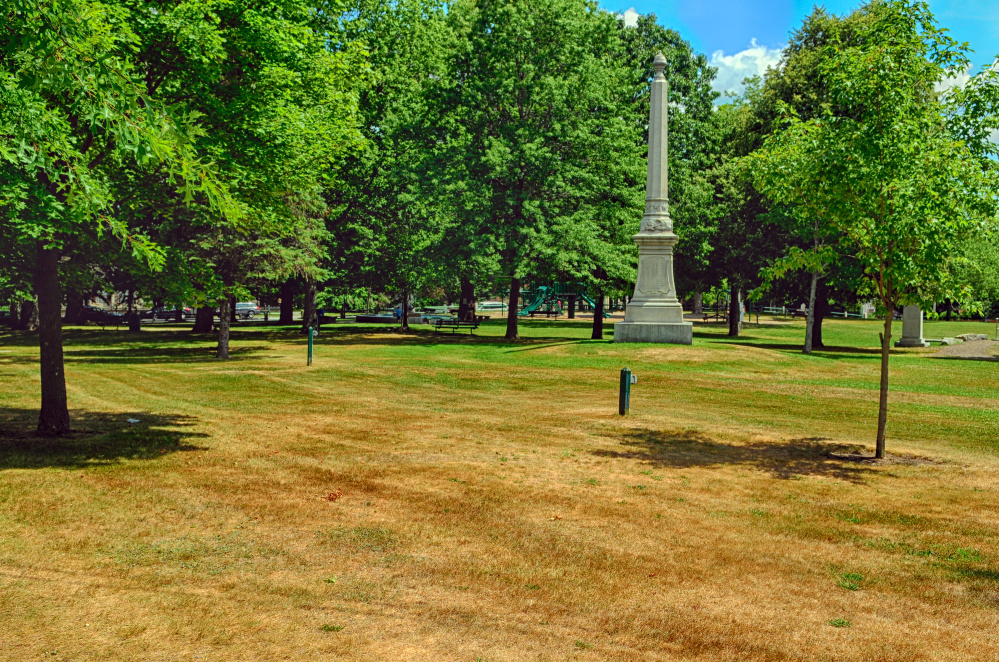This August photo shows brown grass near the Civil War Memorial on Gardiner Common, a sign of the dry weather that has plagued the state in recent months.