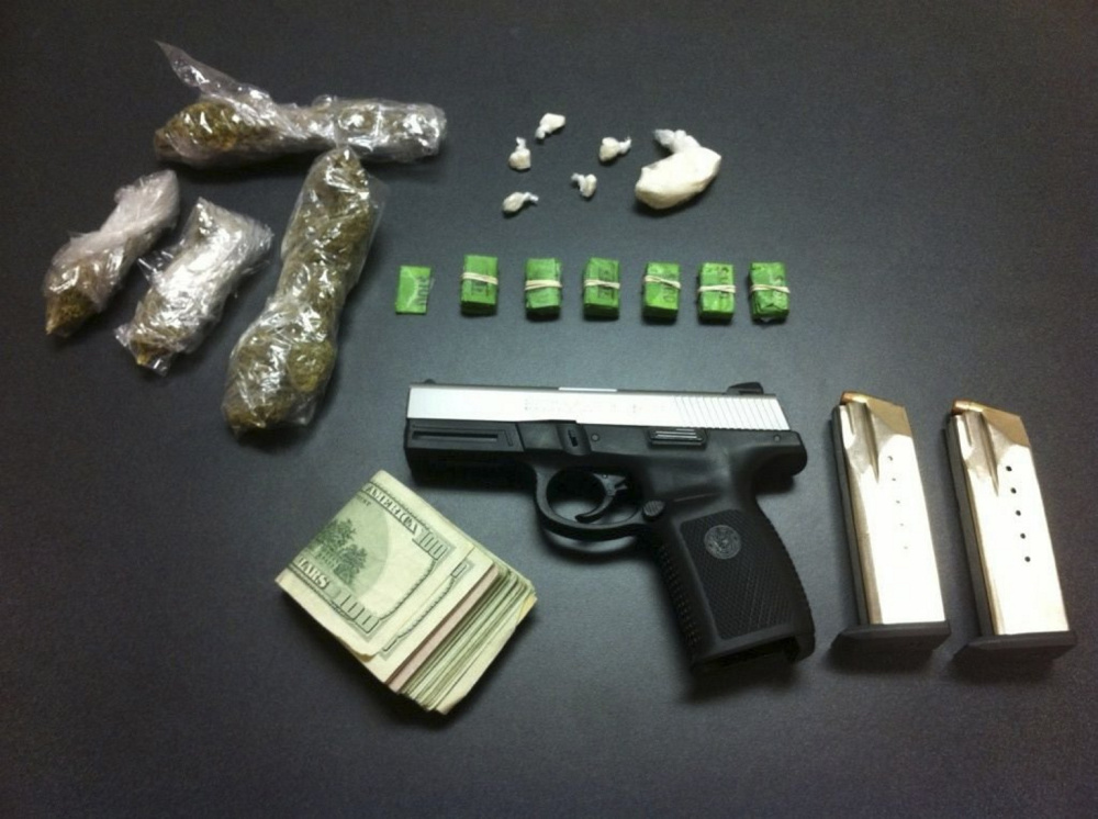 Two people face charges of trafficking in crack cocaine and heroin following their arrest in a Congress Street parking lot Wednesday night. Police seized a half-ounce of crack, 61 bags of heroin and $1,600. Police also found a loaded .40 caliber handgun in the glove box of the couple's car. The couple was arrested at the 1100 block of Congress Street near the intersection with Park Avenue.
