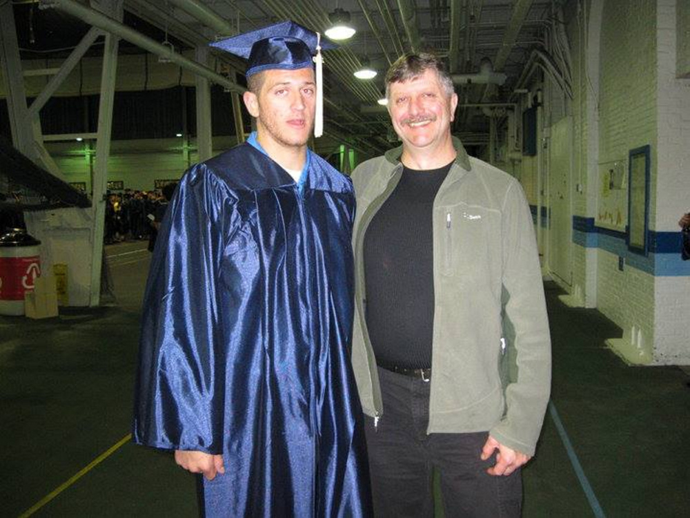 Gary Lisherness, right, of Madison, who died in an ATV accident in Skowhegan, poses with his son, Matthew Lisherness, following his graduation in 2010 from the University of Maine.