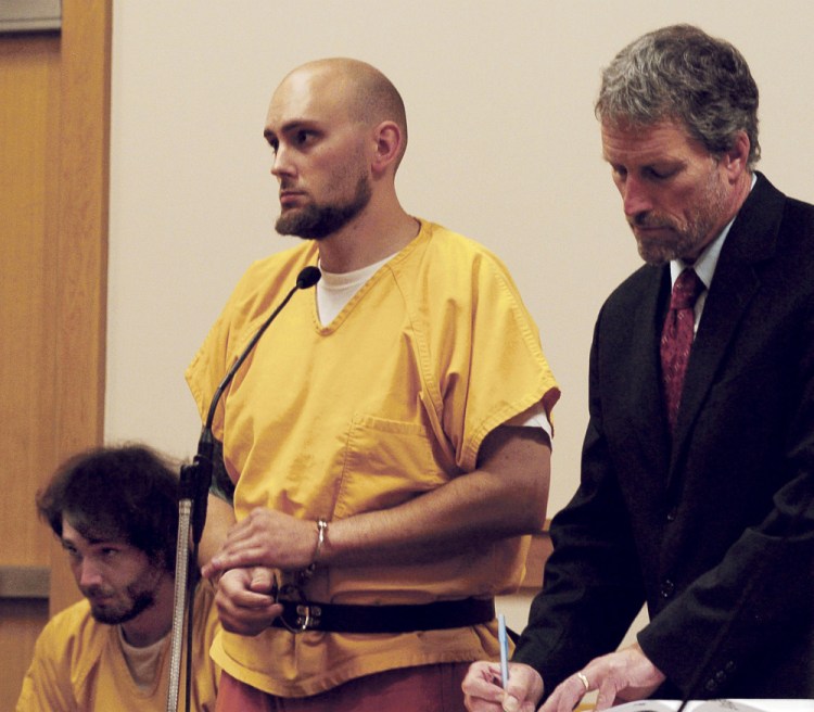 Alexis Casey, center, and his brother Zachary Casey attend a hearing on charges of Class A arson in Skowhegan District Court on Wednesday. Attorney Phil Mohlar, at right, represented the brothers.