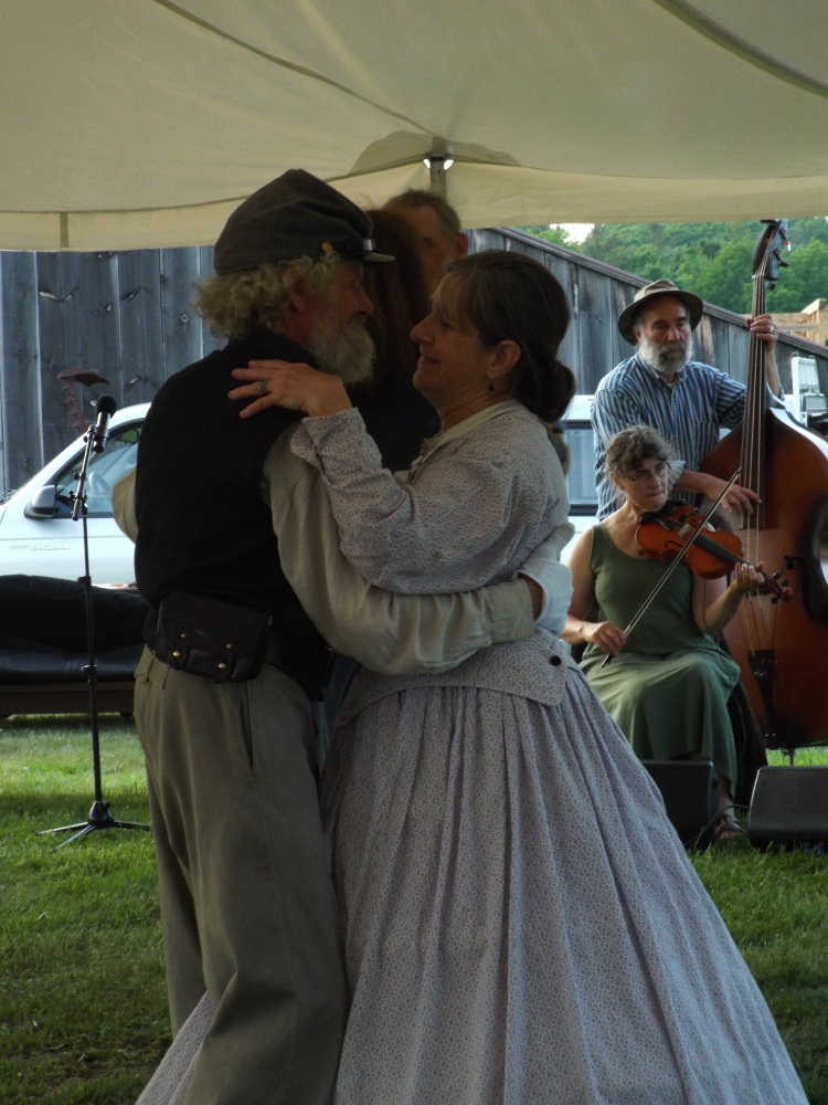 Tom Bassford and Sandra Swatsky dance to the tunes of the Racket Factory during the Rally for Norlands Civil War Reenactment in 2016.