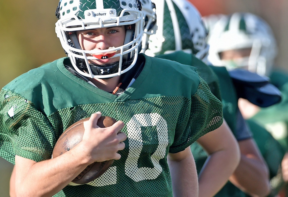 Mount View High School running back Colby Furrow runs during practice in Thorndike on Wednesday.