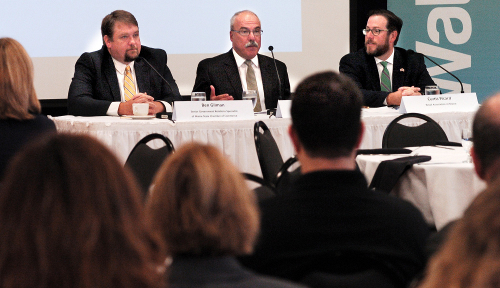 Speakers, from left, Ben Gilman of the Maine State Chamber of Commerce; Greg Dugal, of the Maine Inn Keepers Association; and Curtis Picard, of the Retail Association of Maine, spoke on Thursday against the statewide referendum question on raising the minimum wage during a Mid-Maine Chamber of Commerce meeting Thursday in Waterville.
