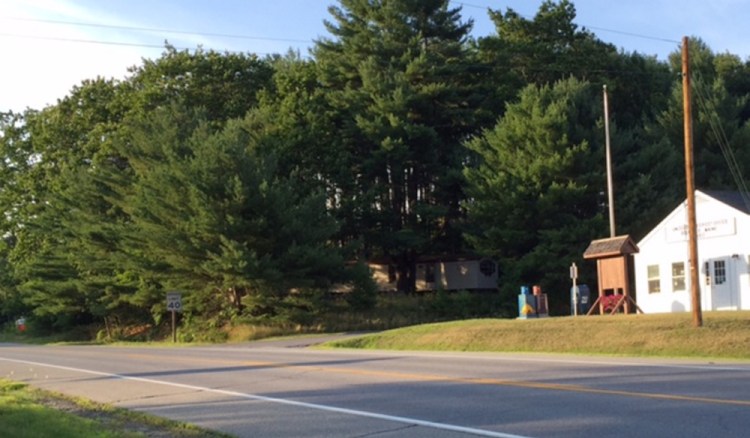 Belgrade officials are considering plans for a Dollar General store, which would be built on the lot between the post office, right, and the Town Office, entrance at far left, on Route 27.