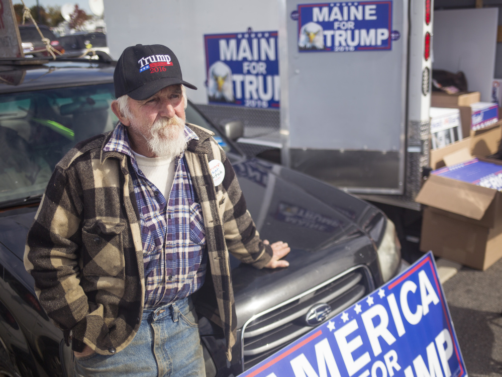Steve Smith of Otter Creek, Maine, waits outside before the Donald Trump rally in Bangor on Saturday.