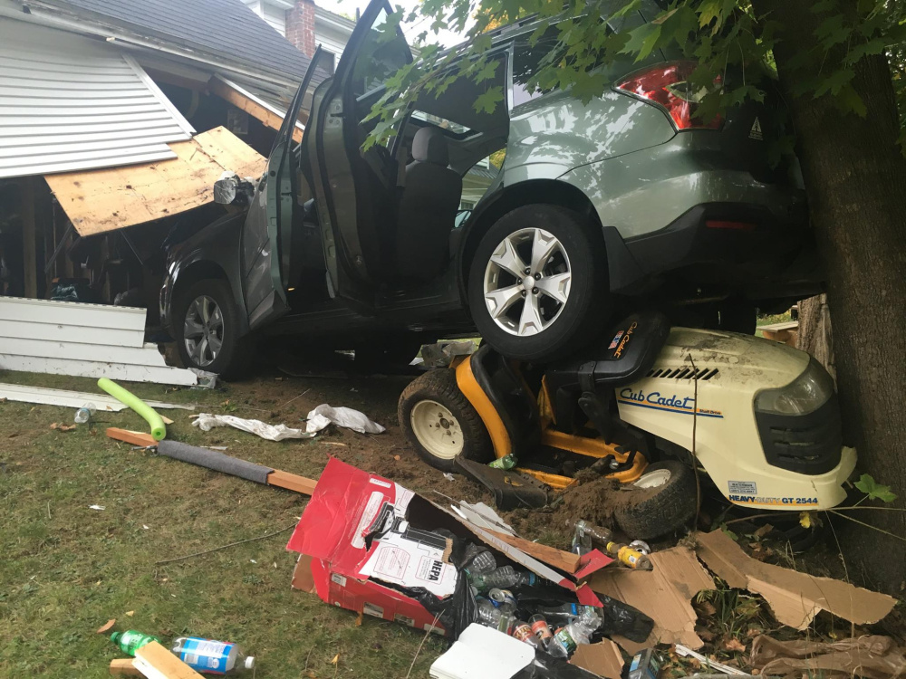Patricia Amero, of Berry Road in Monmouth, backed her vehicle through the rear wall of a garage Tuesday afternoon but was not seriously injured in the accident.