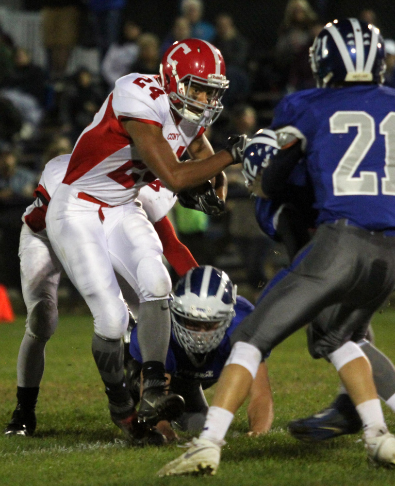 Cony High School's Jordan Roddy carries the ball during a game against Lawrence High School in Fairfield last month.