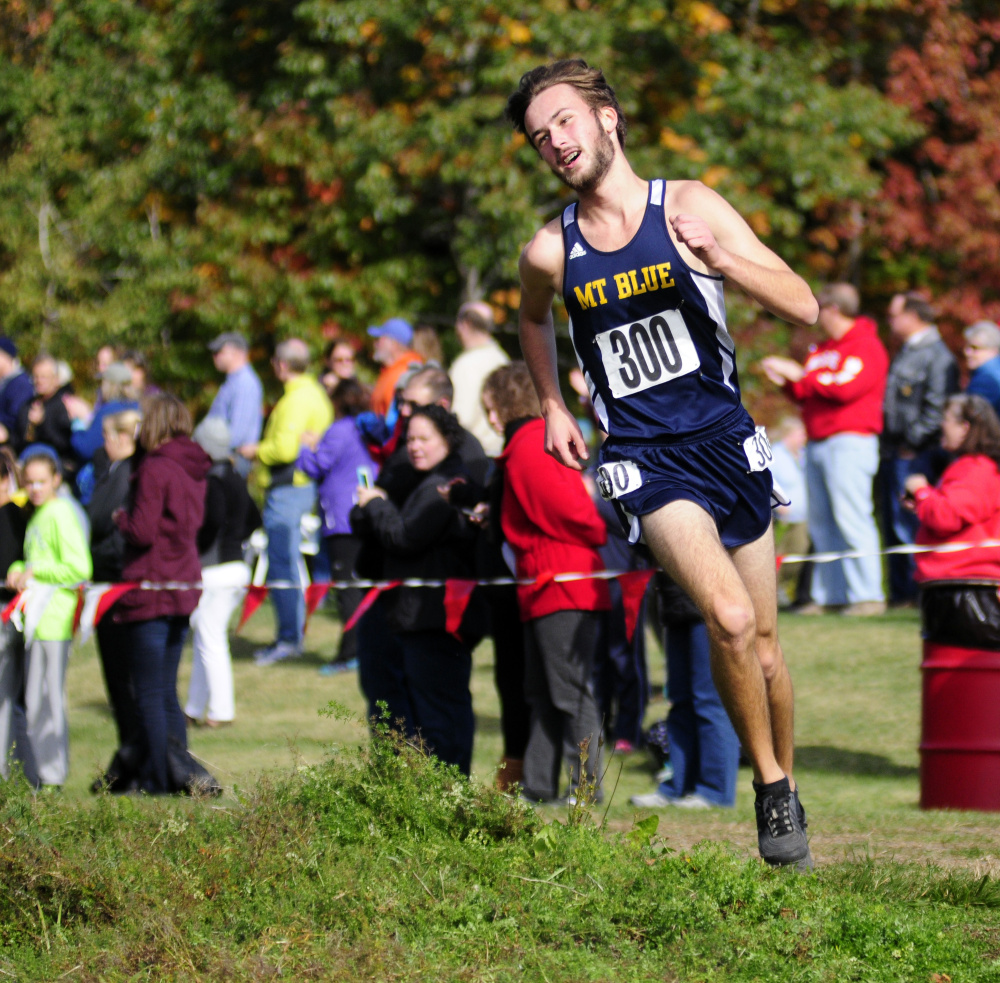 Mt. Blue senior Tucker Barber wins the Kennebec Valley Athletic Conference Class A cross country championship on Oct. 15 at Cony High in Augusta. He finished in 16:43.2.