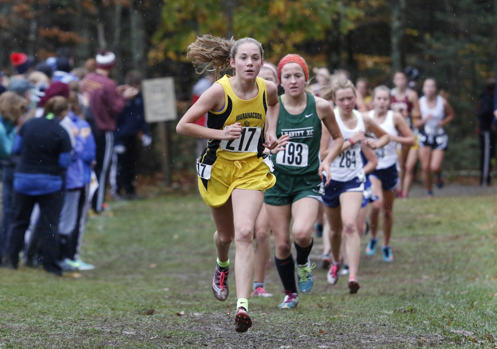 Molly McGrail, center, of Maranacook, competes in the Southern B cross country championships Saturday in Cumberland. She is followed by Julia Labbe, of Leavitt.