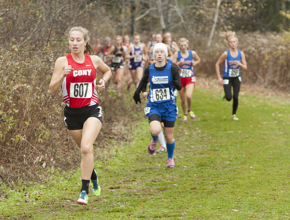 Cony's Anne Guadalupi runs during the Northern A cross country championships Saturday in Belfast. She finished second.