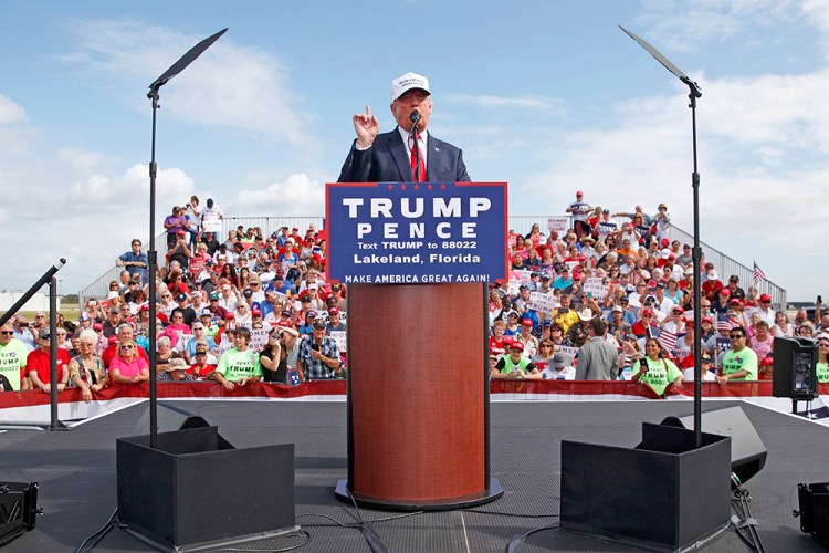 Republican presidential candidate Donald Trump speaks during a campaign rally, Wednesday in Lakeland, Fla., at the same time the NFL is planning to spend  $100 million on new technologies and medical research to better protect players from concussions. <em>Evan Vucci/Associated Press</em>