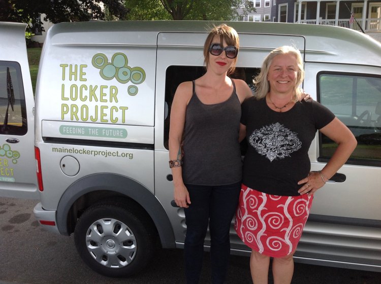 Locker Project founder/board member Katie Wallace, left, and Executive Director Katie Brown pause with the nonprofit’s van before distributing produce at the Eastern Prom playground in Portland on a recent afternoon.