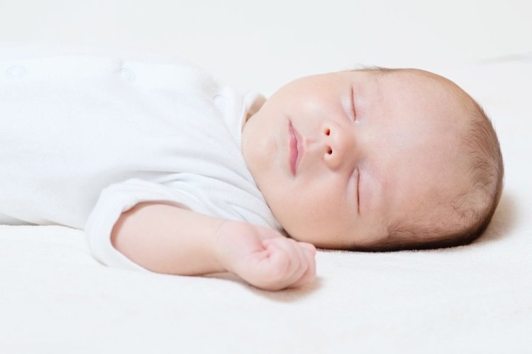 The new recommendations say babies should sleep on a separate surface, in a crib or bassinet, and never on something soft. <em>Shutterstock/Ventura</em>