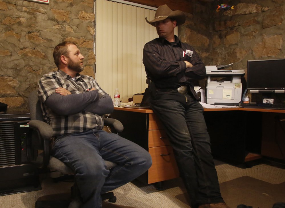 Ryan Bundy, right, and his brother Ammon Bundy in an office at the Malheur National Wildlife Refuge near Burns, Ore., in January.