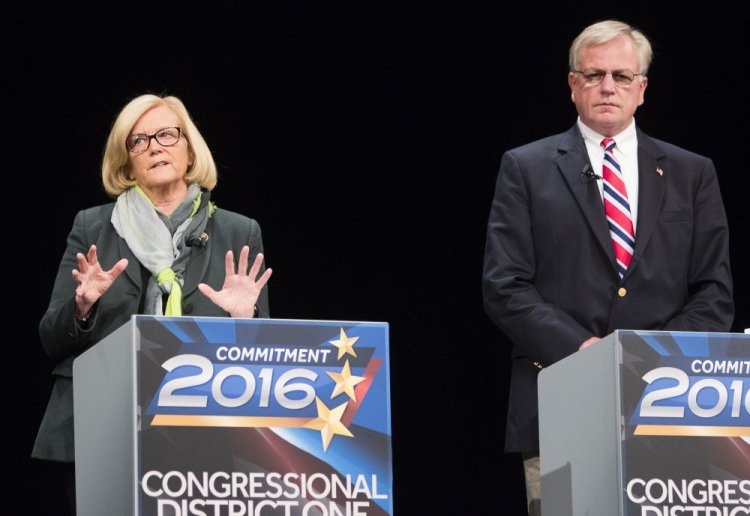 Rep. Chellie Pingree and Republican challenger Mark Holbrook, the candidates for Maine's 1st Congressional District seat, debate Tuesday night at the Westbrook Performing Arts Center.