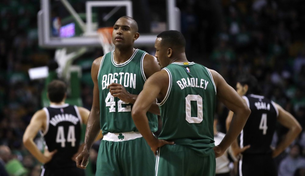 Boston center Al Horford, left, will not play for the Celtics on Wednesday night after entering the NBA's concussion protocol. A collision during practice on Monday did not manifest itself until Tuesday, and the team decided he will not play against the Bulls.