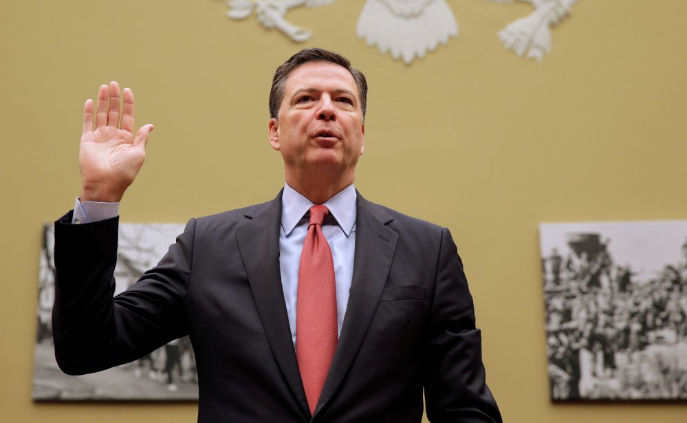 FBI Director James Comey is sworn in before testifying before a House Judiciary Committee hearing in Washington Sept. 28. Officials said he did not notify Congress as soon as he learned about the emails because additional information was needed to proceed.