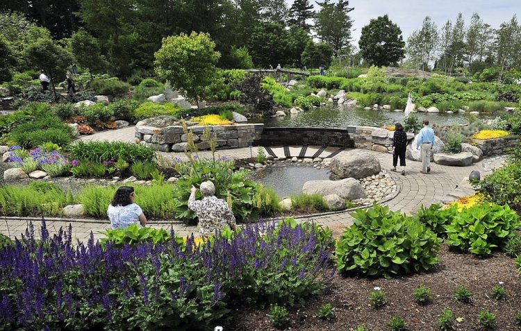 Visitors enjoy the Lerner Garden of the Five Senses at the Coastal Maine Botanical Gardens. A visitor center and conservatory will be added to the grounds in 2017.