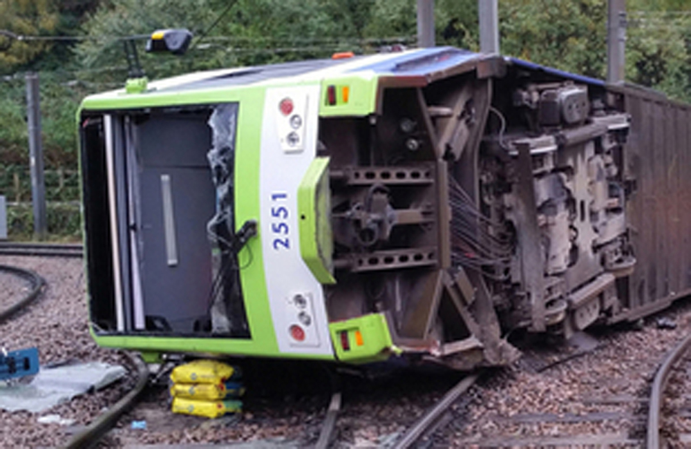 A photo issued by the Rail Accident Investigation Branch of the tram which derailed near the Sandilands stop in Croydon, London, Wednesday, Nov. 9, 2016. Several people were killed and more than 50 injured when a tram derailed in south London during a heavy rainstorm before dawn Wednesday, police said.