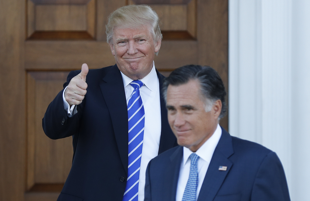 Donald Trump and Mitt Romney are all smiles Saturday at Trump National Golf Club Bedminster in Bedminster, N.J.