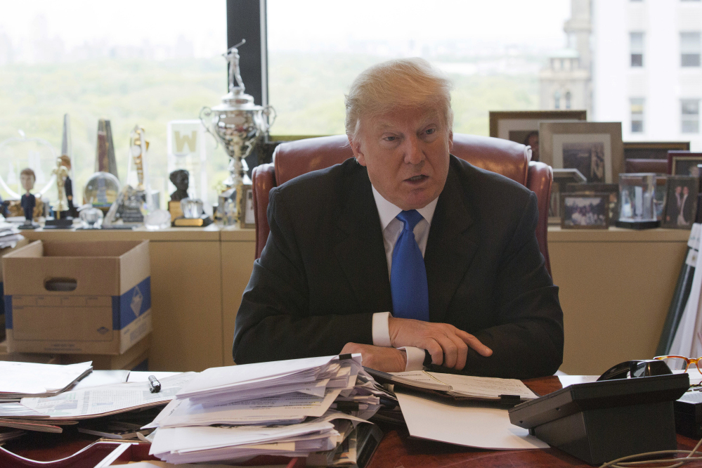 Then-presidential candidate Donald Trump speaks during an interview in his office at Trump Tower in May. Trump's hands-on, minutiae-obsessed management style will be tested by the presidency.