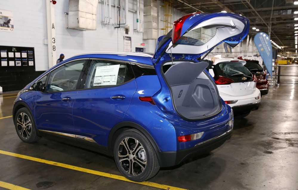 A Chevrolet Bolt EV is displayed at the GM plant in Orion Township, Mich. The Bolt will cost less than the average new U.S. vehicle, but may be a hard sell with gas at just over $2 a gallon.