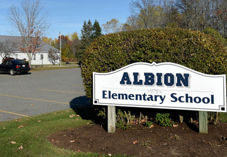 The future of Albion Elementary School is up for debate, with some school board members saying a districtwide elementary school should be built, while others don't want the existing school closed.