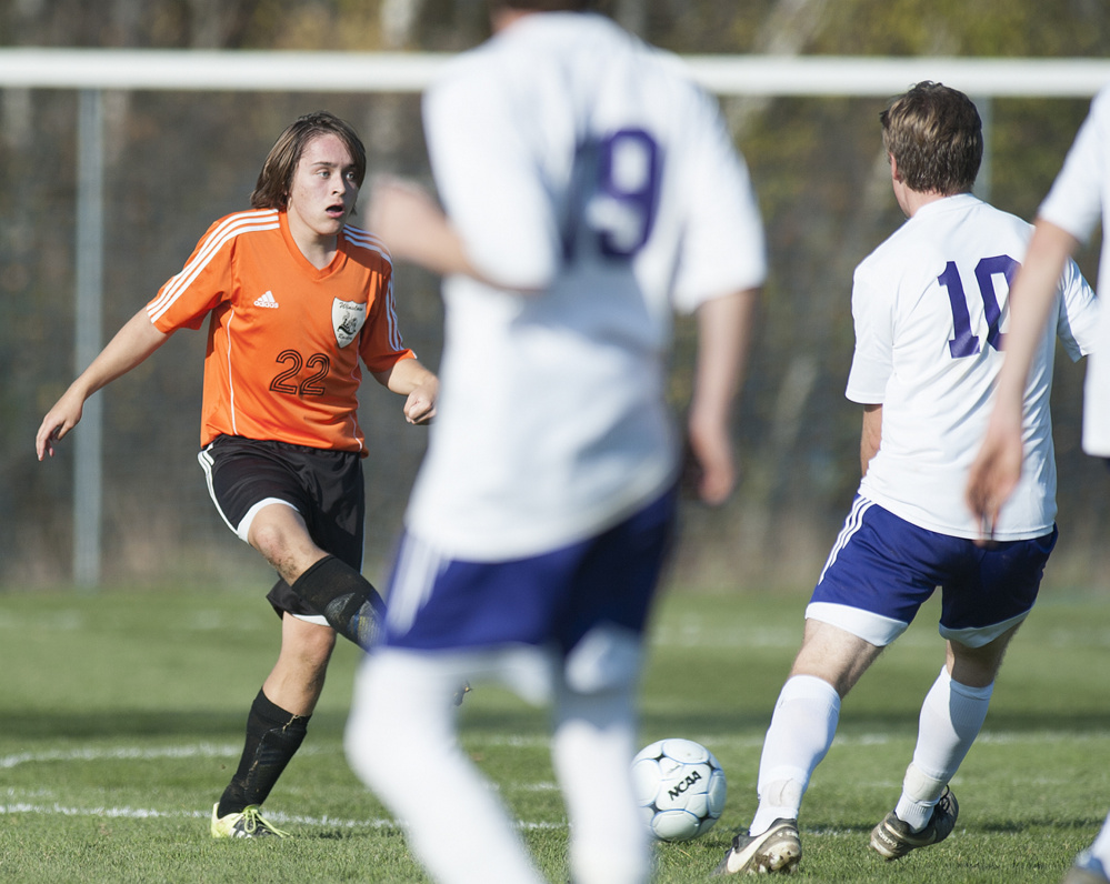 Winslow midfielder Sam Lambrecht looks for the ball during the Class B North final against John Bapst. Lambrecht has bounced back nicely this season after suffering a knee injury last year.