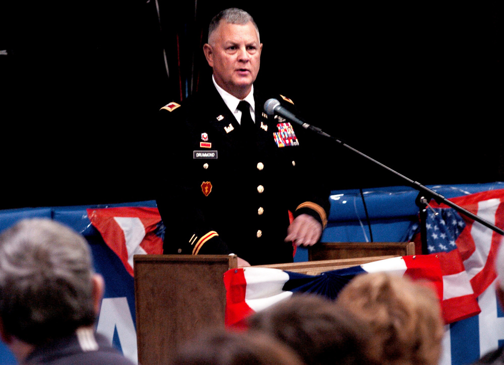 Col. Dwaine Drummond, of the Maine Army National Guard, delivers the keynote address during an assembly Tuesday morning at Erskine Academy in South China honoring veterans in advance of Veterans Day. Drummond, of South China and a graduate of Gardiner High School, recognized veterans for their sacrifices and efforts in ensuring free elections on Election Day.