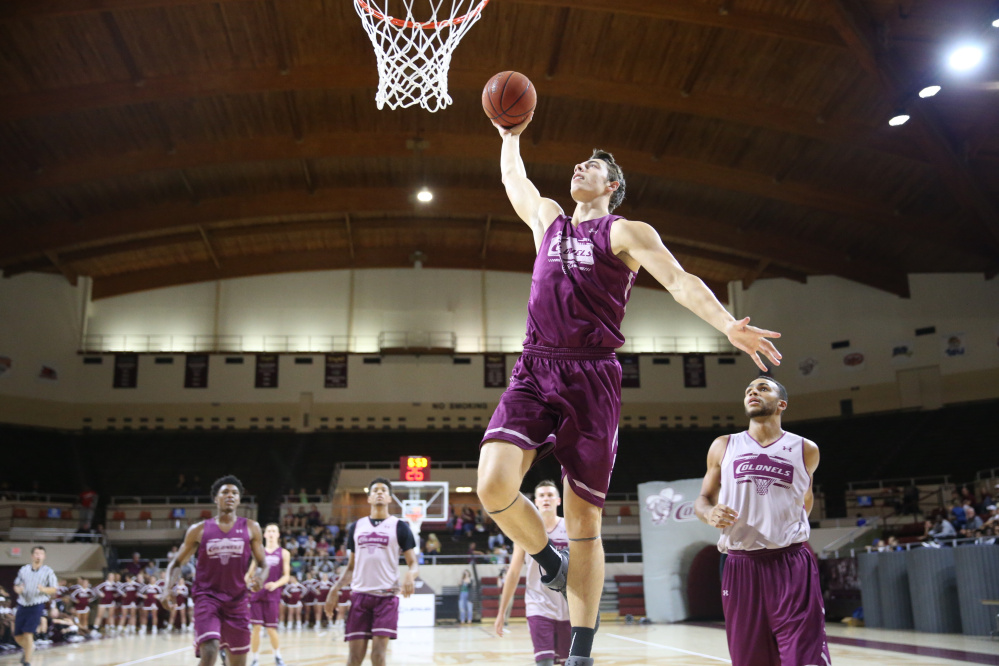 Nick Mayo, a Messalonskee graduate, goes to the hoop during an Eastern Kentucky practice. Mayo averaged 14.5 points, 4.9 rebounds and 1.1 blocks per game for the Colonels last season.
