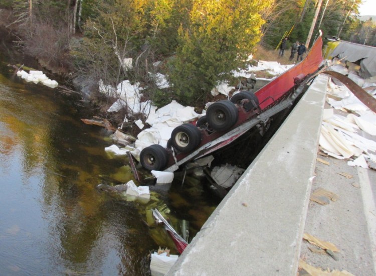 This tractor-trailer truck carrying paper rolled over Thursday morning in Coburn Gore.