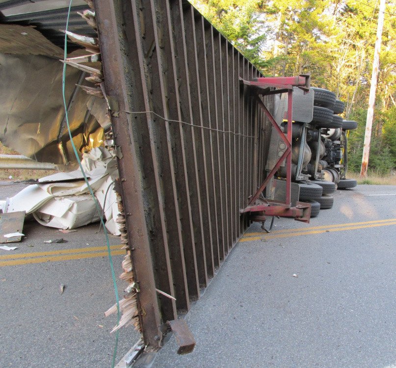 This tractor-trailer truck carrying paper rolled over Thursday morning in Coburn Gore.