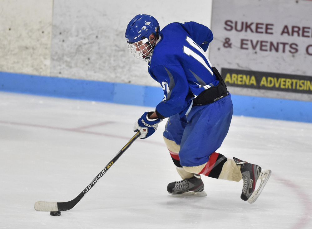 Skowhegan/Lawrence High School's Brady Martin works out at practice Nov. 17, 2015, at Sukee Arena in Winslow. The arena is experiencing problems with equipment it uses to make ice for the hockey season.