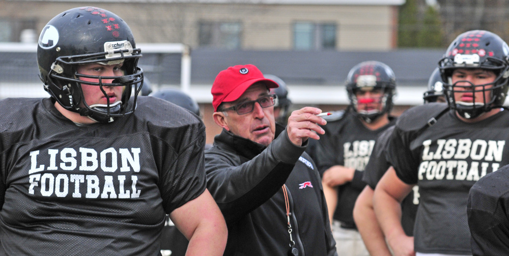 Lisbon head football coach Dick Mynahan runs the Greyhounds through practice Tuesday in Lisbon. The Greyhounds will play Maine Central Institute in the Class D state title game Saturday at Fitzpatrick Stadium in Portland.