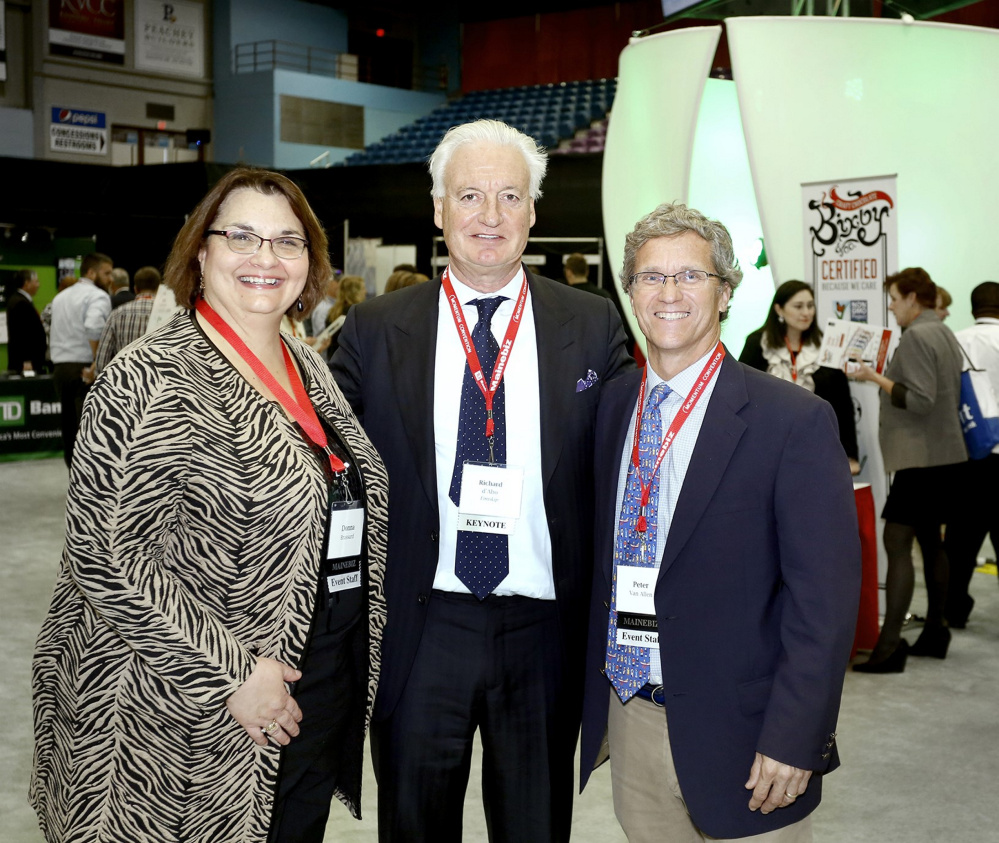 From left to right are Donna Brassard, publisher of Mainebiz, Richard D'Abo, chairman of the board of Eimskip, Peter Van Allen, editor of Mainebiz.
