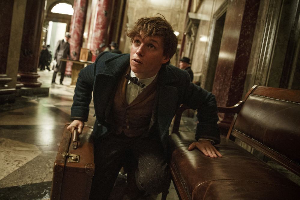 This image released by Warner Bros. Entertainment shows Eddie Redmayne in a scene from, "Fantastic Beasts and Where to Find Them."