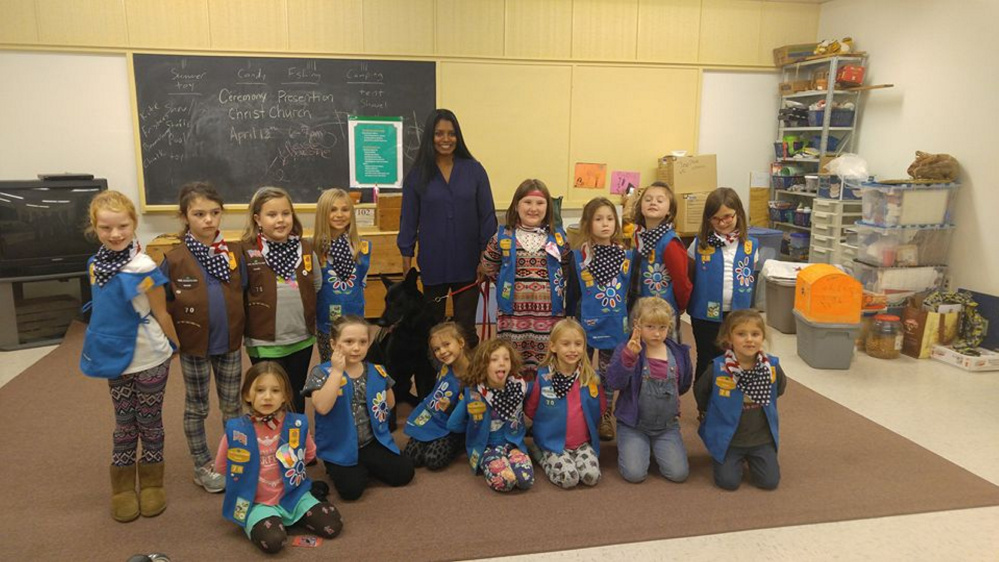 Girl Scout Daisy/Brownie Troop 70 from Gardiner welcomed Helania Lake, a disabled veteran, and her service dog, Xena, to their Nov. 9 meeting. Front, from left, are Sophie Moore, Emma Buzzell, Talia Migliaccio, Ada Phillips, Evy Kokmyer, Maddie Peters and Jayden Barber. Back, from left, are Rachel Grant, Emma Lee Briere, Victoria Tracey, Natalie Fikus, Xena (dog), Lake, Ashlyn Dutille, Amiah Graves, Ayla McCurdy and Riley Keyser.